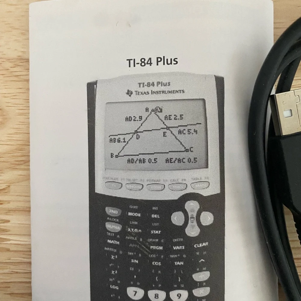 Texas Instruments Black TI-84 Plus with USB Cable and Manual - Picture 3 of 4